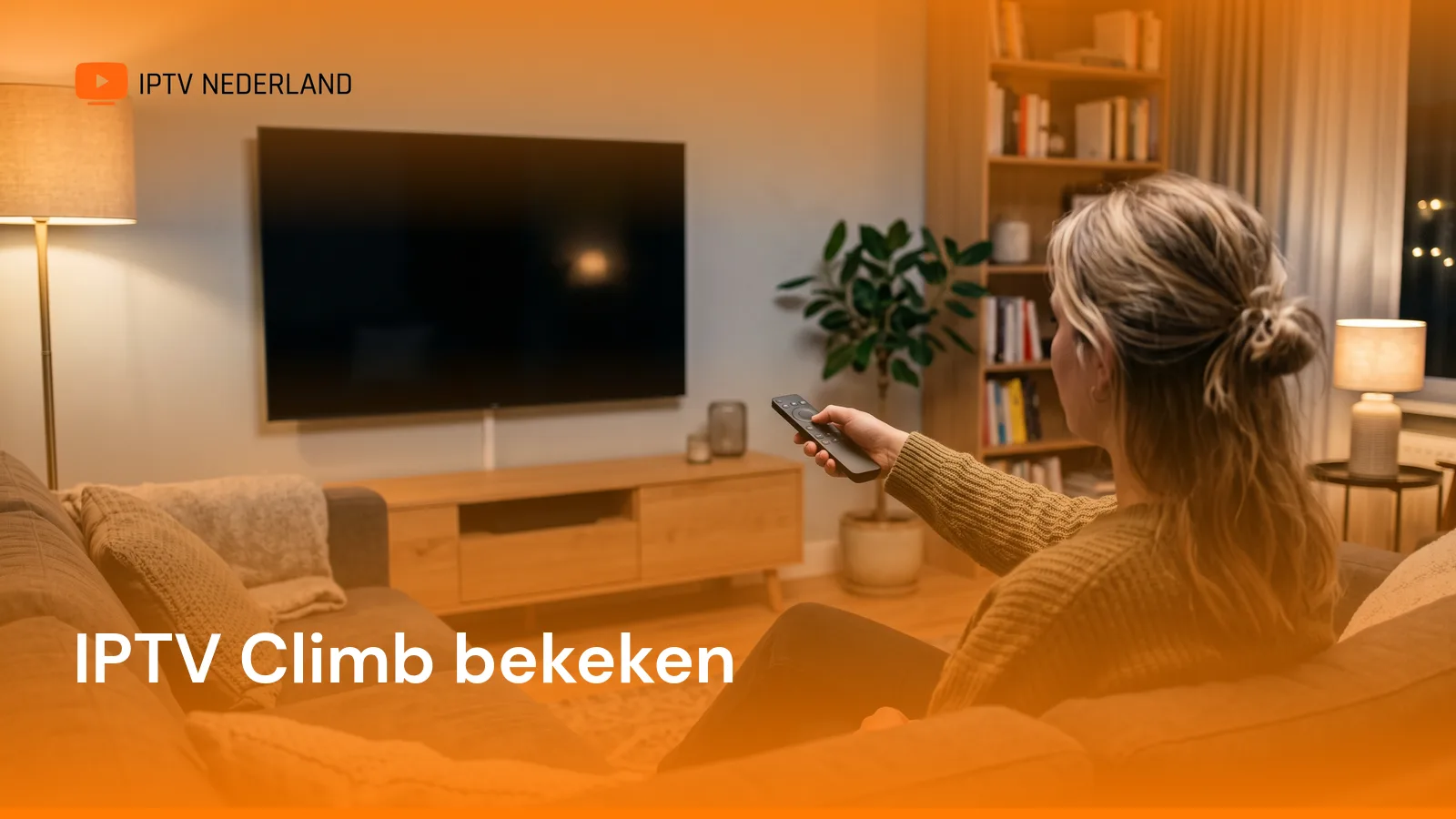 Iemand op een bank richt een afstandsbediening op een uitgeschakelde televisie, met het logo van IPTV Nederland en de titel IPTV Climb bekeken